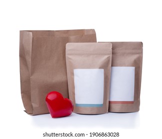 Mock Up Of Recycling  Paper Bag, Coffee Bean Bag And Red Heart On White Background