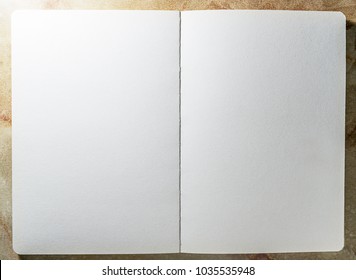 Mock Up Template Of Open Page Blank Sketch Book Paper On The Table