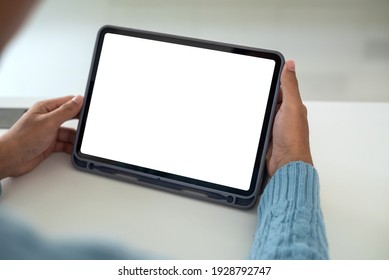 Mock Up. Man Holding Tablet White Blank Screen At Home.