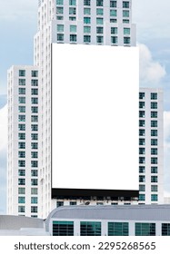 Mock up white large LED display vertical billboard on tower building .clipping path for mockup - Shutterstock ID 2295268565