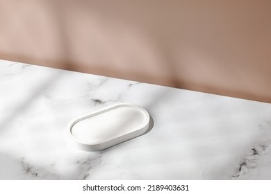 Mock up of white round little tray, stand with window shadow. Minimal cosmetic background for product presentation. Beige background.