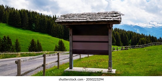 Mock Up Wooden Board Advertising. Billboard At The Mountain Rural Road. Old Wooden Background Display Your Product Insert Text. Retro Vintage Decoration Style. Blank Billboard For Advertisement.