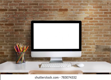 Mock up : Workspace with blank white desktop computer, pencils and stationery items. Blank screen for graphics display montage. - Powered by Shutterstock