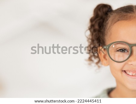 Mockup, advertising and girl with glasses from optometrist for vision in eyes at a clinic, store or shop. Half, happy and child with medical eyeglasses from optician with mock up space for marketing