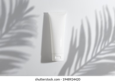 Mockup Of Beauty Fashion Cosmetic Makeup Bottle Lotion Product With Skincare Healthcare Concept On Summer Palm Leaf Tree Background