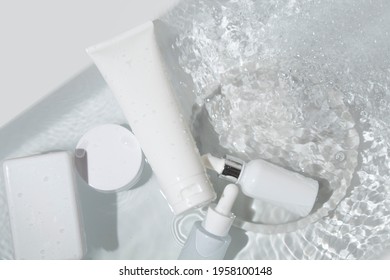 Mockup Of Beauty Fashion Cosmetic Makeup Bottle Lotion Product With Skincare Healthcare Concept On Water Pool Background