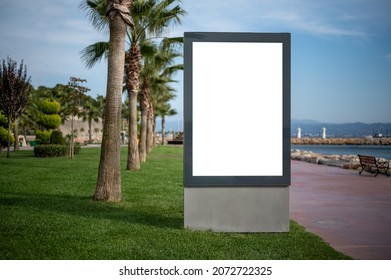 Mockup Billboard With White Blank Space. Billboard Outdoors, Outdoor Advertising, Public Information Placeholder Board Near The Beach Sea