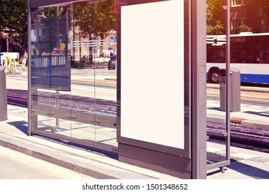 Mockup Of A Blank Empty White Advertising Urban Billboard, Placeholder Template At City Train Stop, Space For Design Layout.