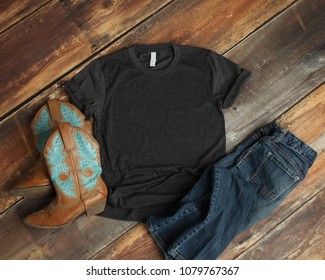 Mockup Of Blank Gray Tshirt On Rustic Wood Background With Cowboy Boots And Jeans