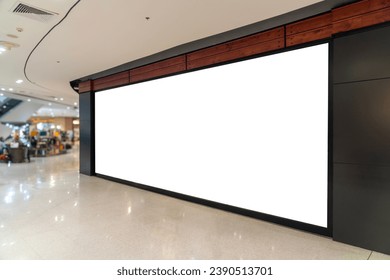 Mockup of a blank store front billboard in a shopping mall. Perfect for showcasing your logo and branding.