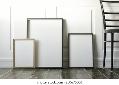 Mockup Of Blank Three Frame Poster On The Floor