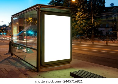 Mockup Of Bus Stop Advertising Billboard In City Street At Night. Poster Light Box With Car Light Streaks - Powered by Shutterstock