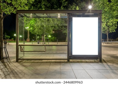 Mockup Of Bus Stop Vertical Billboard In Front Of Empty Street Background At Night. Blank Advertising Display In A Park - Powered by Shutterstock