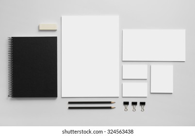 Mockup business brand template on gray background. Set of stationery with a black notepad. - Shutterstock ID 324563438