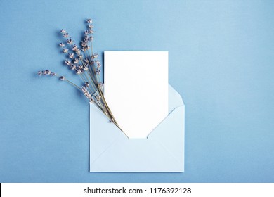 Mockup With Card And Lavender In Blue Envelope. Top View.