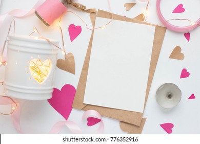 mockup card with paper hearts. Valentines invitation card with environment. garlang, lights, roses candies, gifts