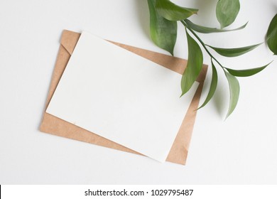 Mockup Card With Plants. Invitation Card With Environment And Details Mockup With Postcard And Flowers On White Background.