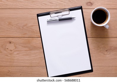 Mockup For Check List, Empty Note Paper With Pen And Coffee Cup On Brown Wood Background. Office, Writer Or Study Concept