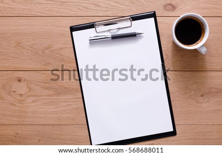 Mockup for check list, empty note paper with pen and coffee cup on brown wood background. Office, writer or study concept