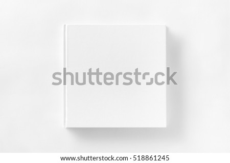Mockup of closed blank square book at white textured paper background.