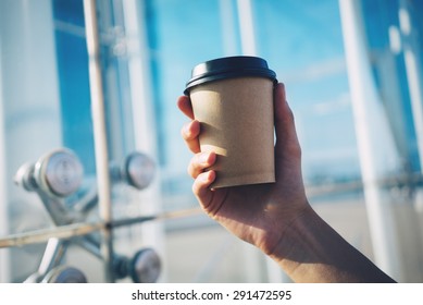 Mockup Of Coffe Cup Holding In Hand