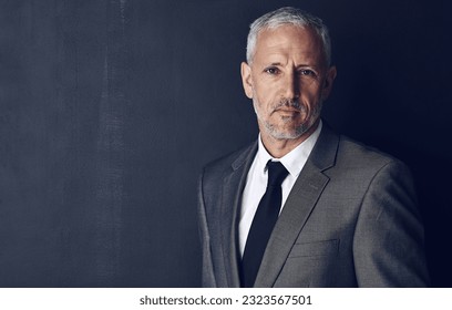 Mockup, confidence and studio portrait of businessman in suit, serious and pride on dark background. Boss, ceo and business owner with professional career, senior model executive management with job. - Shutterstock ID 2323567501
