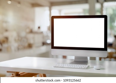 Mockup Desktop Blank Screen Computer On White Wood Table.