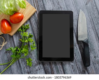 Mockup Digital Menu At The Kitchen With Vegetables