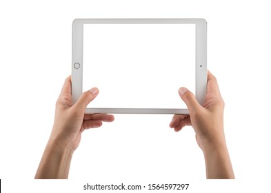 Mock-up Digital Tablet In Hand Isolated On White Background With Clipping Path Inside