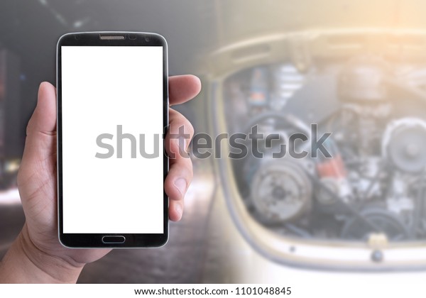 mockup display mobile phone in hand with\
blurred background