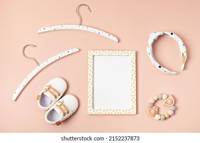 Mockup Of Empty Frame With Eco Friendly Baby Accessories. Baby Shower Invitation, Greeting Card. Template For Brand, Logo, Advertising. Flat Lay, Top View