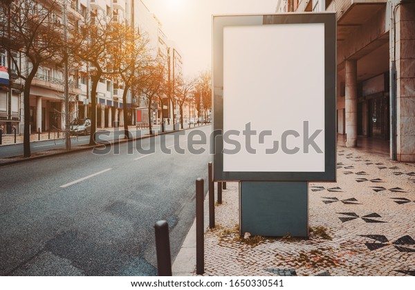 Mock-up of an empty information poster on the\
pavement; a blank street banner template on a sidewalk in a city;\
an outdoor billboard placeholder mockup near the road with a copy\
space area on the left
