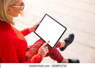 Mockup empty screen of tablet computer used by woman