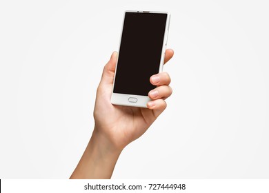 Mockup Of Female Hand Holding Frameless Cell Phone With Black Screen Isolated At White Background.