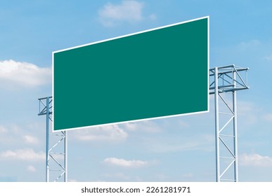 Mockup green road sign with blue sky background