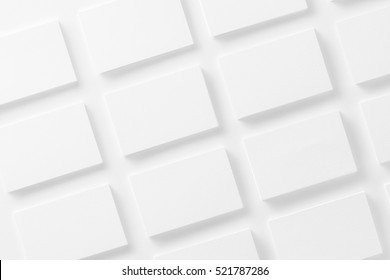 Mockup Of Horizontal Business Cards Stacks Arranged In Rows At White Textured Paper Background.