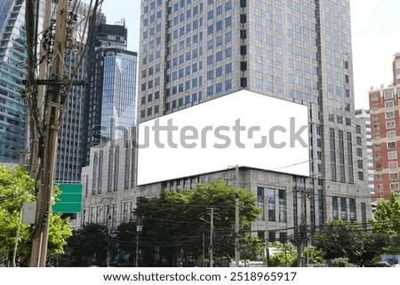 Mockup image of Blank billboard white screen posters and led outside building for advertising, Building Billboard Mockup