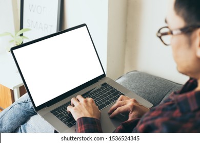 mockup image blank screen computer with white background for advertising text,hand man using laptop contact business search information on desk in office.marketing and creative design - Shutterstock ID 1536524345