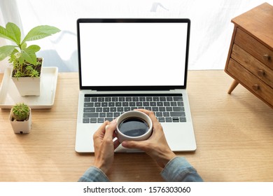 Mockup Image Blank Screen Computer With White Background For Advertising Text,hand Man Using Laptop Contact Business Search Information On Desk In Office.marketing And Design