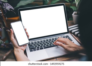 mockup image blank screen computer,cell phone with white background for advertising text,hand man using laptop texting mobile contact business search information on desk in office.design creative work - Powered by Shutterstock