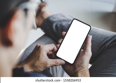 Mockup Image Blank White Screen Cell Phone.men Hand Holding Texting Using Mobile White Background Empty Space For Advertise Text.people Contact Marketing Business And Technology