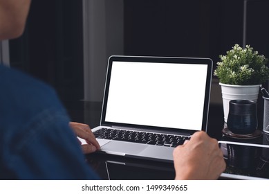 Mockup Image Of Business Man Working On Blank Screen Laptop, Computer On Table, Typing On Keyboard, Networking In Modern Office For Website Or Application Design, Close Up, Over Shoulder View