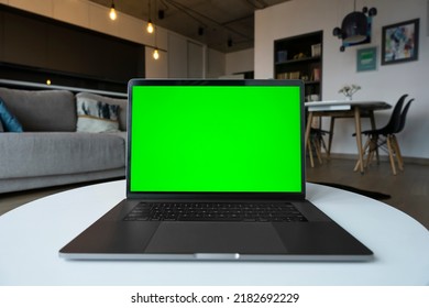 Mockup Image Of Laptop Computer With Green Screen Chromakey For Advertising Application App. Freelance Concept. Online Work At Home, E Learning Distance Training Course, Surfing Internet. No People