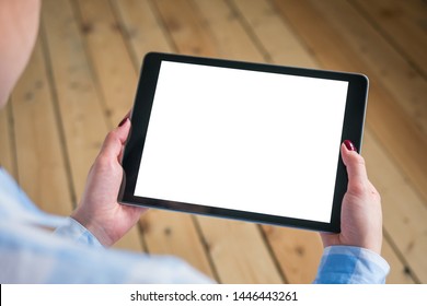 Mockup Image: Over Shoulder Close Up View Of Woman Looking At Modern Digital Tablet Computer Device With White Blank Screen. Mock Up, Copyspace, Leisure Time, Template And Technology Concept