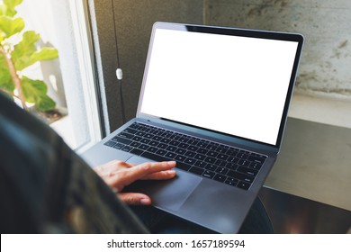 Mockup Image Of A Woman Using And Touching On Laptop Computer Touchpad With Blank White Desktop Screen 