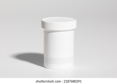 Mockup Of Isolated Plastic Medicine Bottle, For Pills, With Screw Cap And Blank Label For Packaging Design, On White Background, Real Studio Photo Product, No 3D