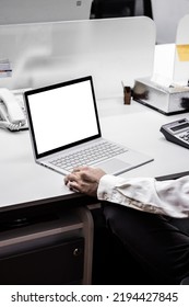 Mockup Laptop Computer Using With A Man On Office Desk.