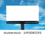 Mockup Large white blank billboard or white promotion poster displayed on the outdoor against the blue sky background. Promotion information for marketing announcements and details