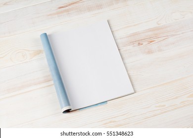 Mock-up Magazine Or Catalog On Wooden Table. Blank Page Or Notepad On Wood Background. Blank Page Or Notepad For Mockups Or Simulations.