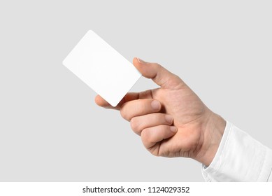 Mockup Of Male Hand Holding A Business Card Isolated On Light Grey Background. Rounded Corner, Europe Standard Size 85×55 Mm.